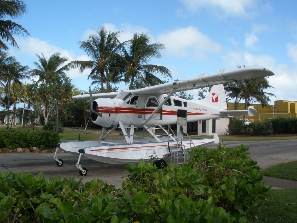 One of the Air Whitsundays Beaver amphibs taking off from the sea off Whitehaven Beach