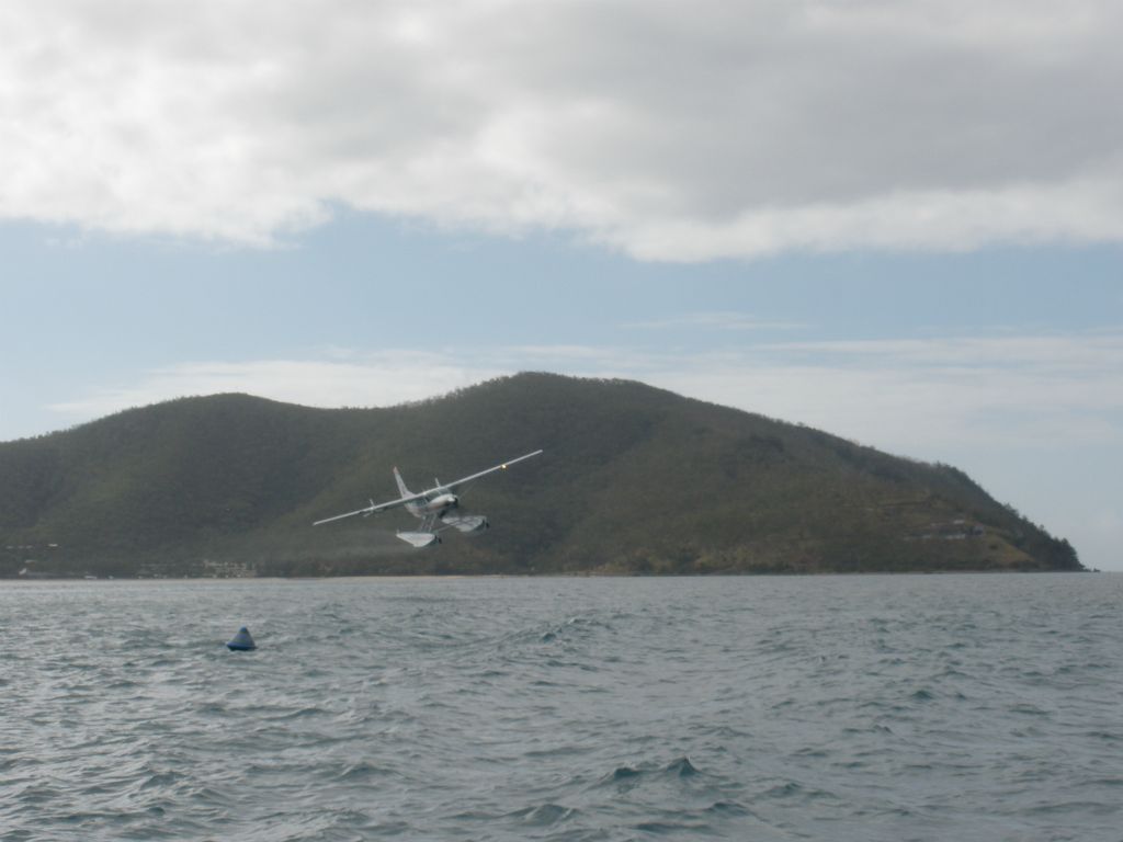 Two of the Air Whitsundays Cessna Caravans doing a formation landing at Hayman Island. One of them was our ride home, ...I guess the other just wanted to keep him company =o