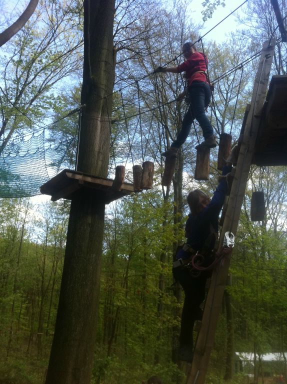 Katka on a zip line at the Aachener Kletterwald