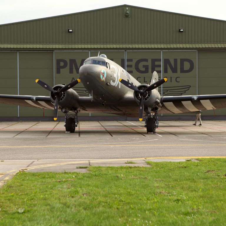 The DC-3 'Drag-em-Oot' taxiing for the lift to Renkum at the Op Market Garden 68th commemoration (and Pete's 100th jump). She's called 'Drag-em-Oot' coz she was used after the Op to recover gliders with a snatch gear ;-)